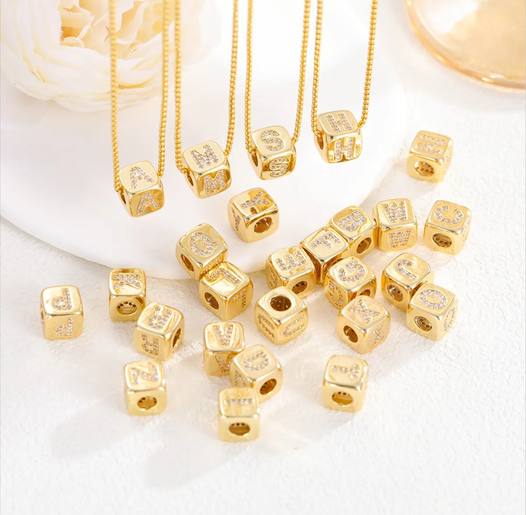 Stainless steel necklace with cube letter